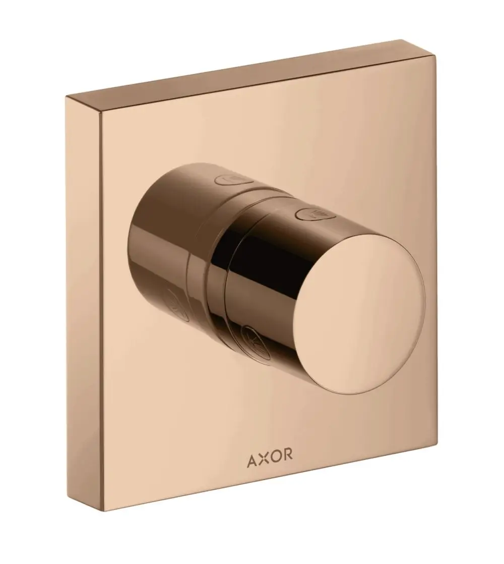 Produkt von AXOR: Rundes Ab- und Umstellventil auf quadratischer Unterputzplatte in polierter roter Goldoptik.